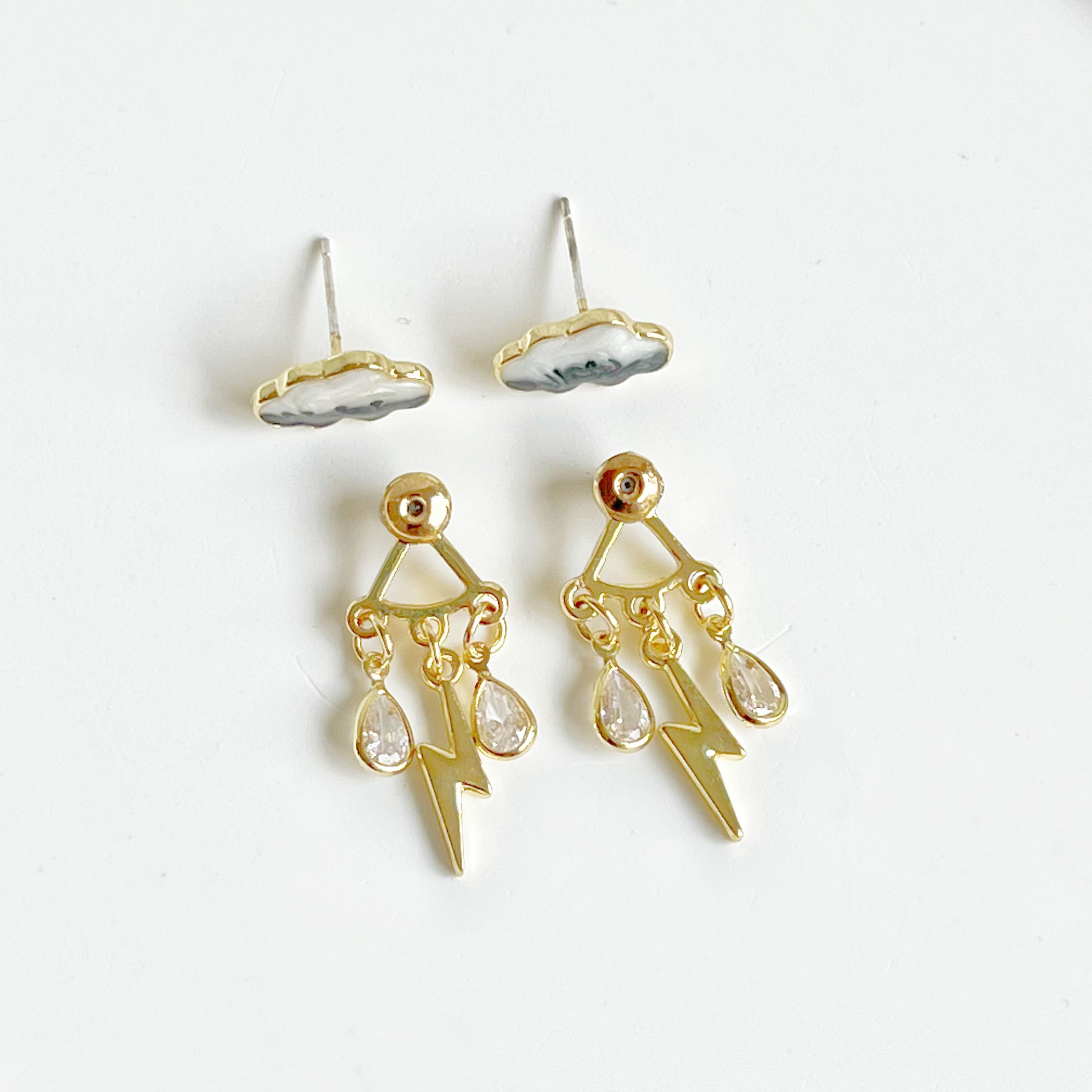Handmade Thunderstorm Rain Cloud Earrings featuring sterling silver studs and gold plated bronze base, symbolizing positivity.