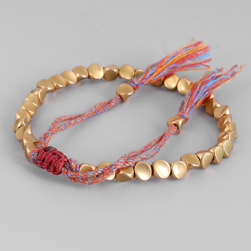 Tibetan Copper Beads Braided Cotton Good Luck Friendship Bracelet, featuring handmade copper beads and adjustable cotton rope.