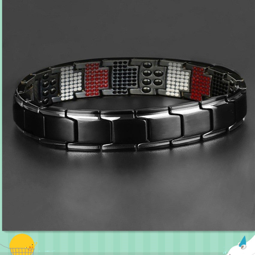 A stylish titanium magnetic bracelet for men, featuring a sleek stainless steel design with a polished finish.