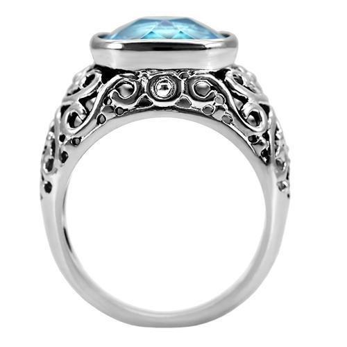 TK020 High Polished Stainless Steel Ring featuring a synthetic sea blue glass center stone, showcasing its elegant design and polished finish.