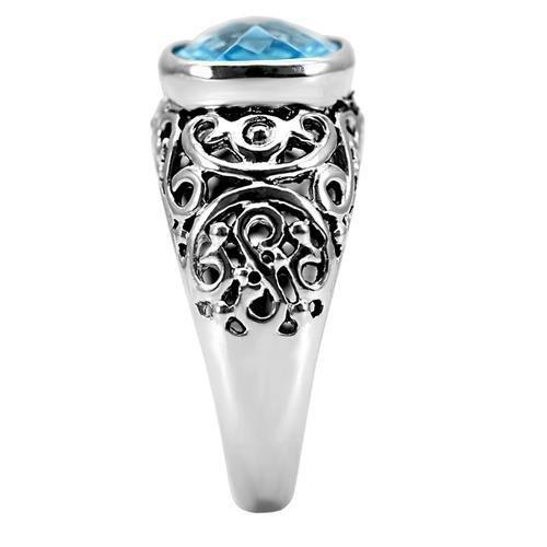 TK020 High Polished Stainless Steel Ring featuring a synthetic sea blue glass center stone, showcasing its elegant design and polished finish.