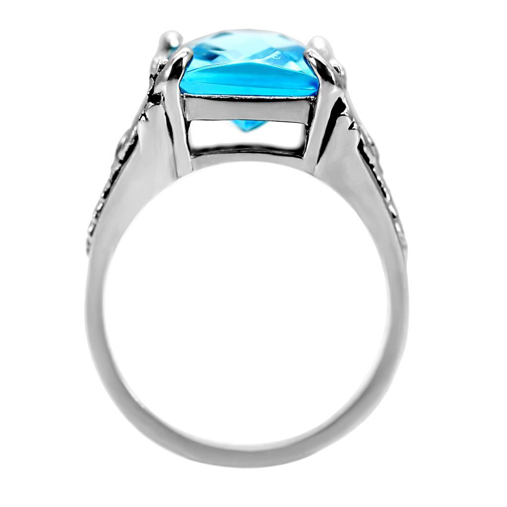TK021 High Polished Stainless Steel Ring featuring a synthetic sea blue glass center stone, showcasing its elegant design and polished finish.