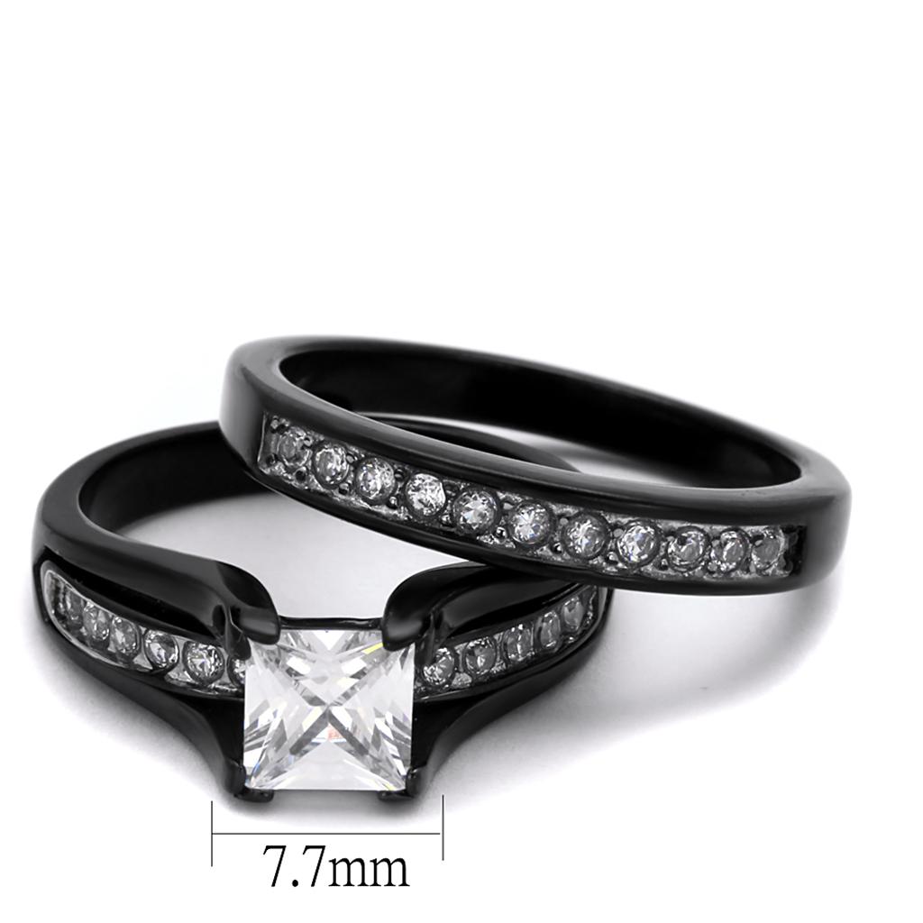 Two-tone IP black stainless steel ring featuring a clear AAA grade cubic zirconia center stone, showcasing a modern and elegant design.