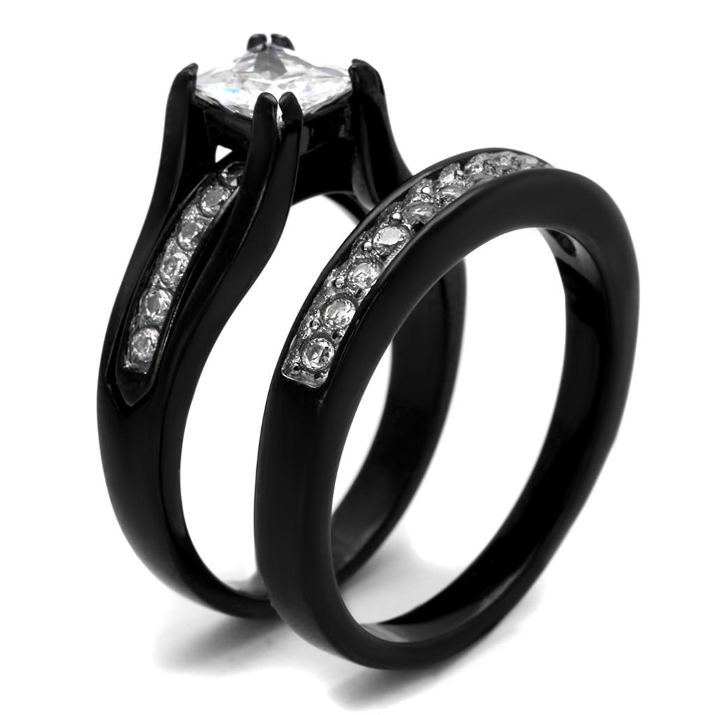 Two-tone IP black stainless steel ring featuring a clear AAA grade cubic zirconia center stone, showcasing a modern and elegant design.