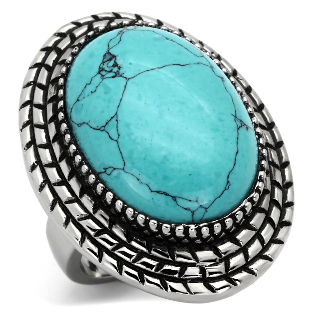 TK1022 High Polished Stainless Steel Ring featuring a vibrant sea blue turquoise stone, showcasing its elegant design and polished finish.