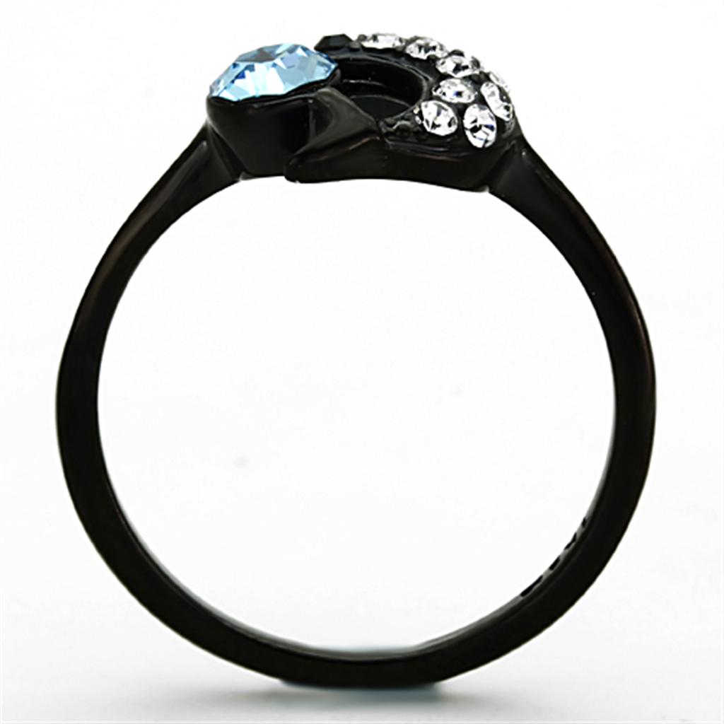 Black ring with blue gemstone