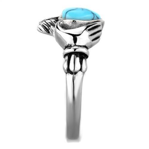 High polished stainless steel ring featuring a vibrant sea blue synthetic turquoise stone, elegantly designed for everyday wear.