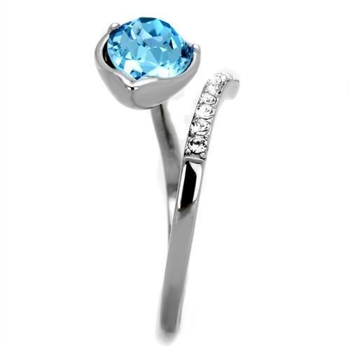 High polished stainless steel ring featuring a sea blue top grade crystal, showcasing elegance and durability.