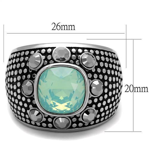 Silver ring with green gemstone