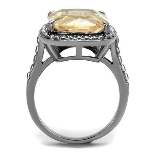 TK2503 High Polished Stainless Steel Ring featuring AAA Grade Champagne CZ stone, showcasing its elegant design and shine.