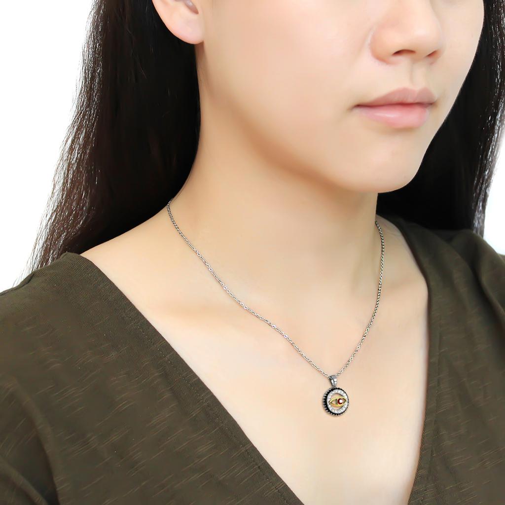 TK2527 Two-Tone IP Gold Stainless Steel Chain Pendant featuring a garnet crystal centerpiece, showcasing elegance and durability.