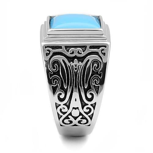 TK3188 High Polished Stainless Steel Ring featuring a vibrant sea blue synthetic turquoise stone, showcasing its elegant design.