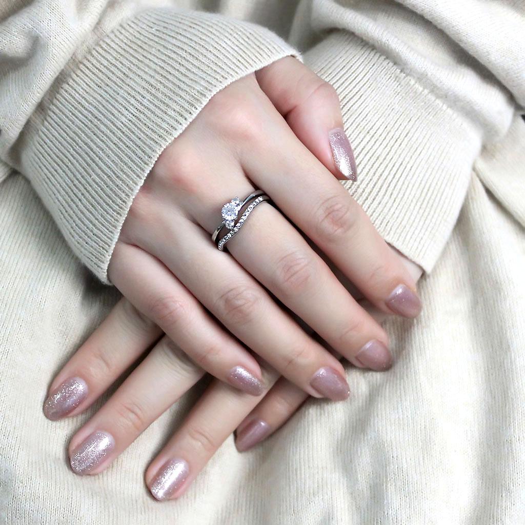 TK3507 High Polished Stainless Steel Ring featuring a clear AAA Grade CZ stone, showcasing a sleek and modern design.