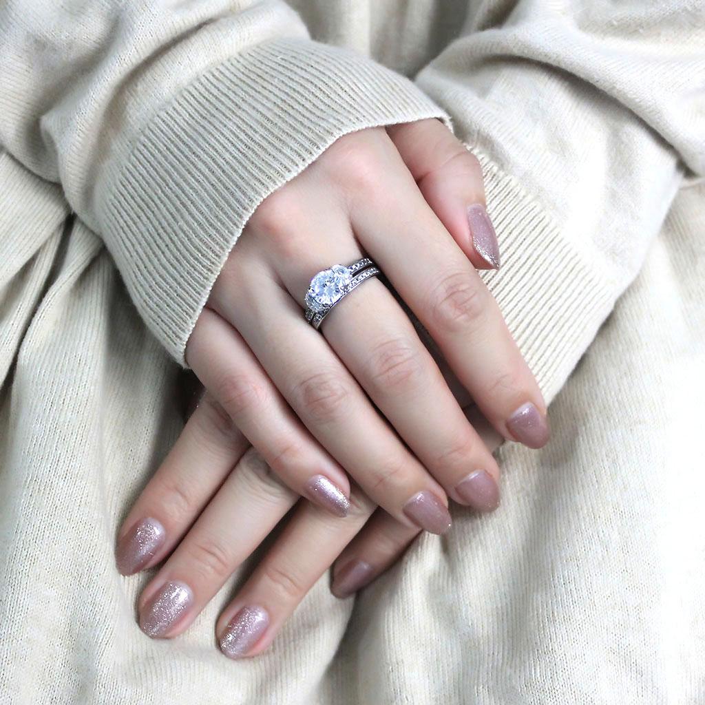 TK3509 High Polished Stainless Steel Ring featuring a clear AAA Grade CZ stone, showcasing its elegant design and shiny finish.