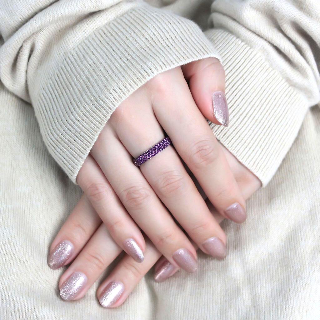 High polished stainless steel ring featuring a top grade amethyst crystal, showcasing a sleek and modern design.