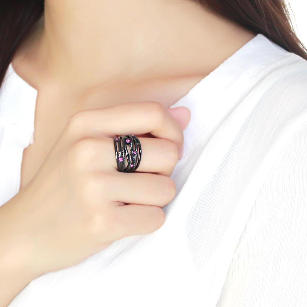 TK3565 IP Black Stainless Steel Ring featuring a vibrant fuchsia top-grade crystal, showcasing a modern and elegant design.