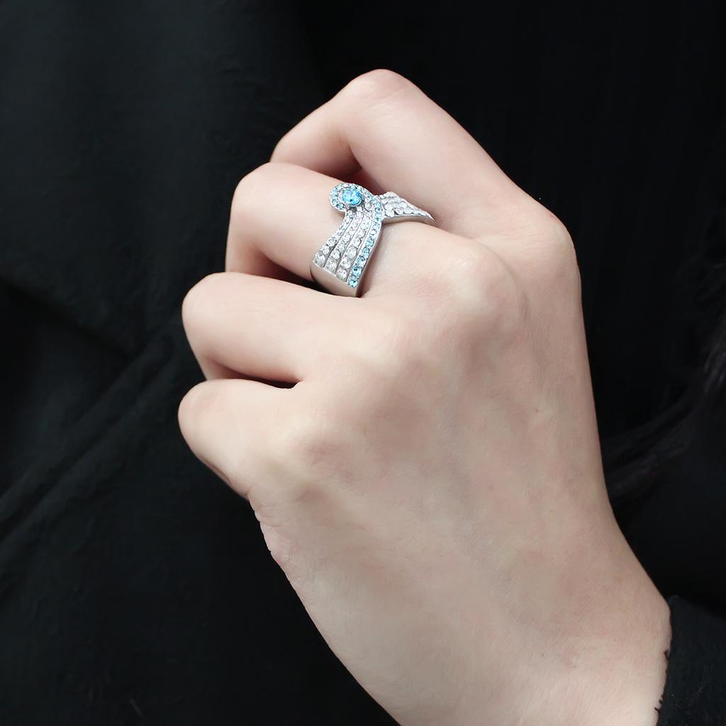 TK3572 No Plating Stainless Steel Ring featuring a brilliant AAA Grade CZ in a vibrant sea blue color, showcasing its elegant design.