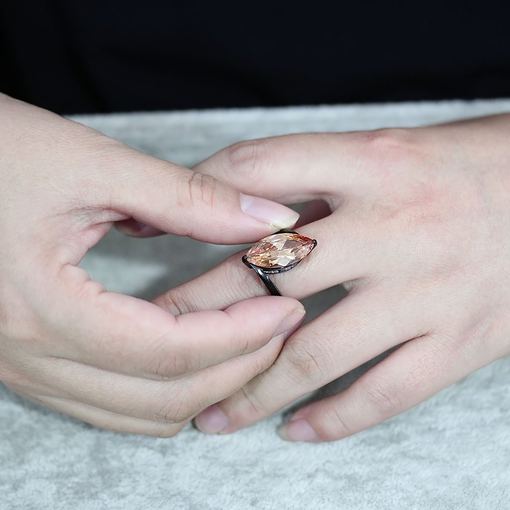 TK3745 IP Black Stainless Steel Ring featuring AAA Grade CZ stone in champagne color, showcasing a modern design.