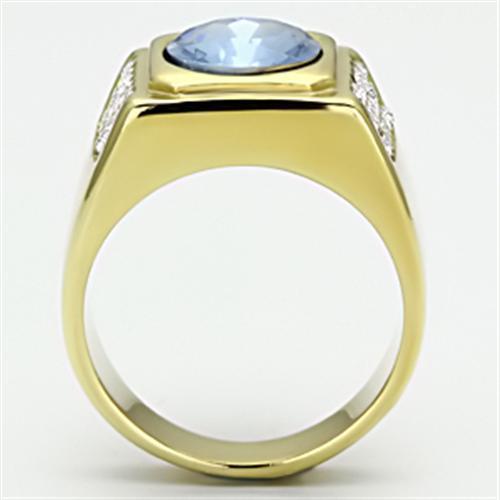 TK730 IP Gold Stainless Steel Ring featuring a light sapphire synthetic glass center stone, showcasing a luxurious and elegant design.