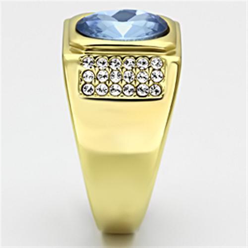 TK730 IP Gold Stainless Steel Ring featuring a light sapphire synthetic glass center stone, showcasing a luxurious and elegant design.