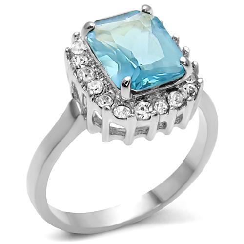 High polished stainless steel ring featuring a sea blue synthetic glass stone, showcasing a sleek and modern design.