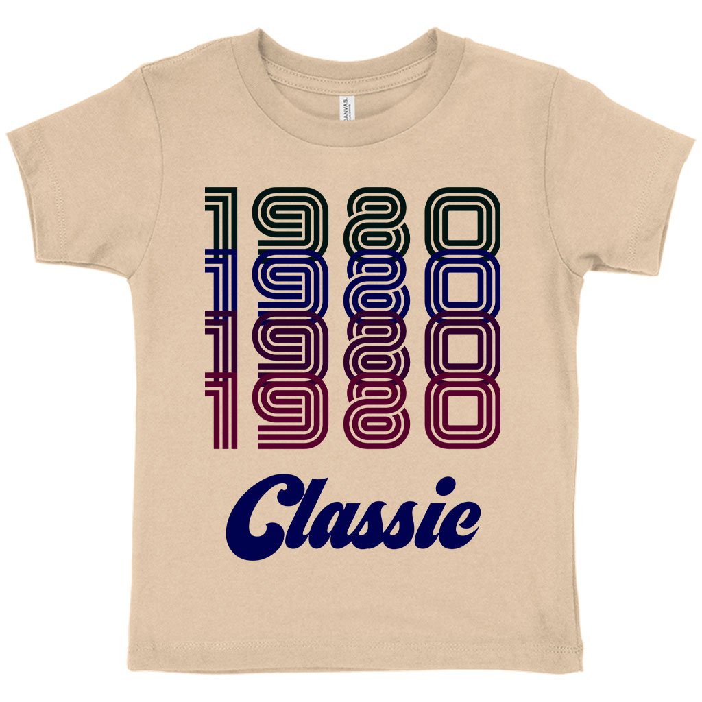 Toddler wearing a soft and stylish 1980 Classic T-Shirt, showcasing vibrant colors and retro design.