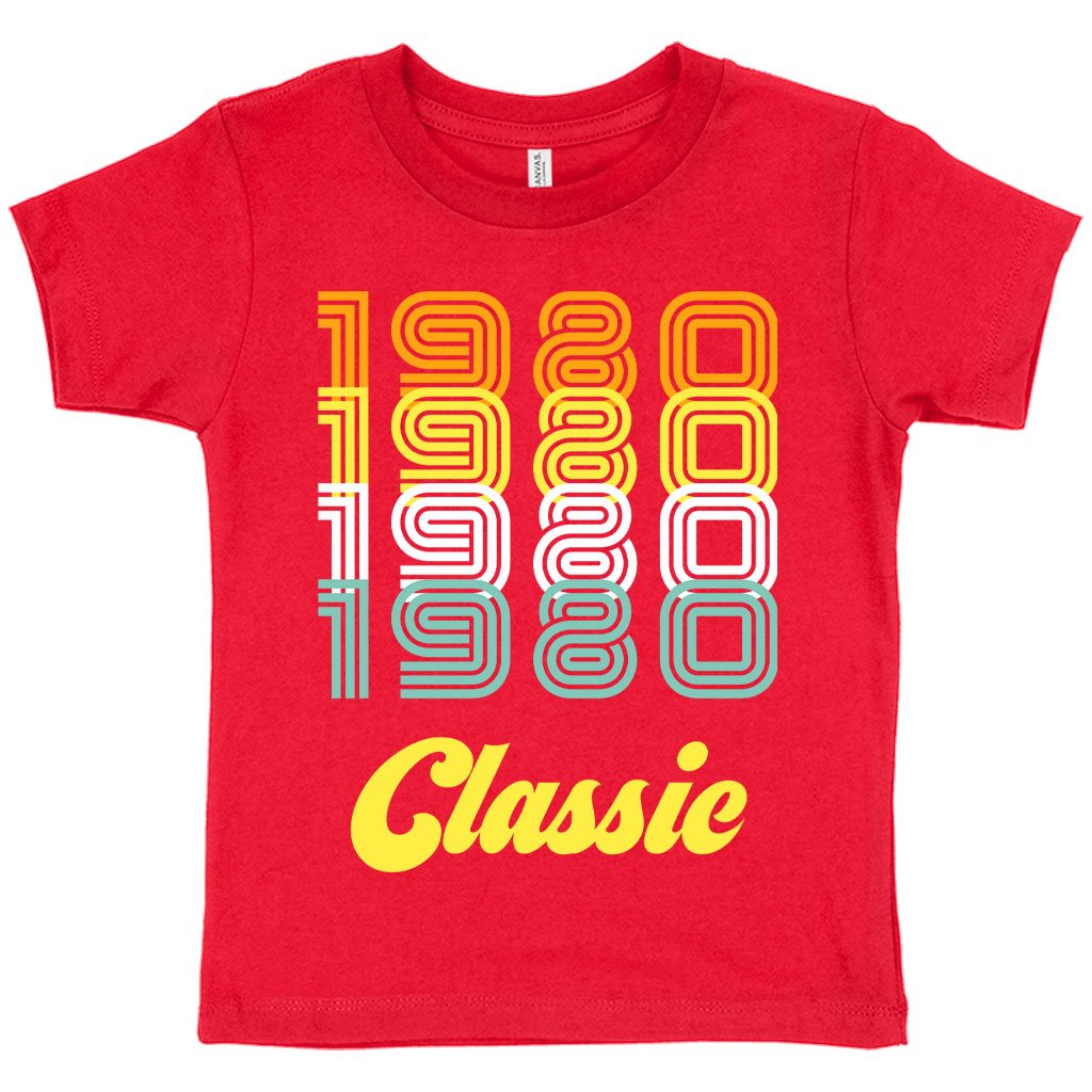 Toddler wearing a soft and stylish 1980 Classic T-Shirt, showcasing vibrant colors and retro design.