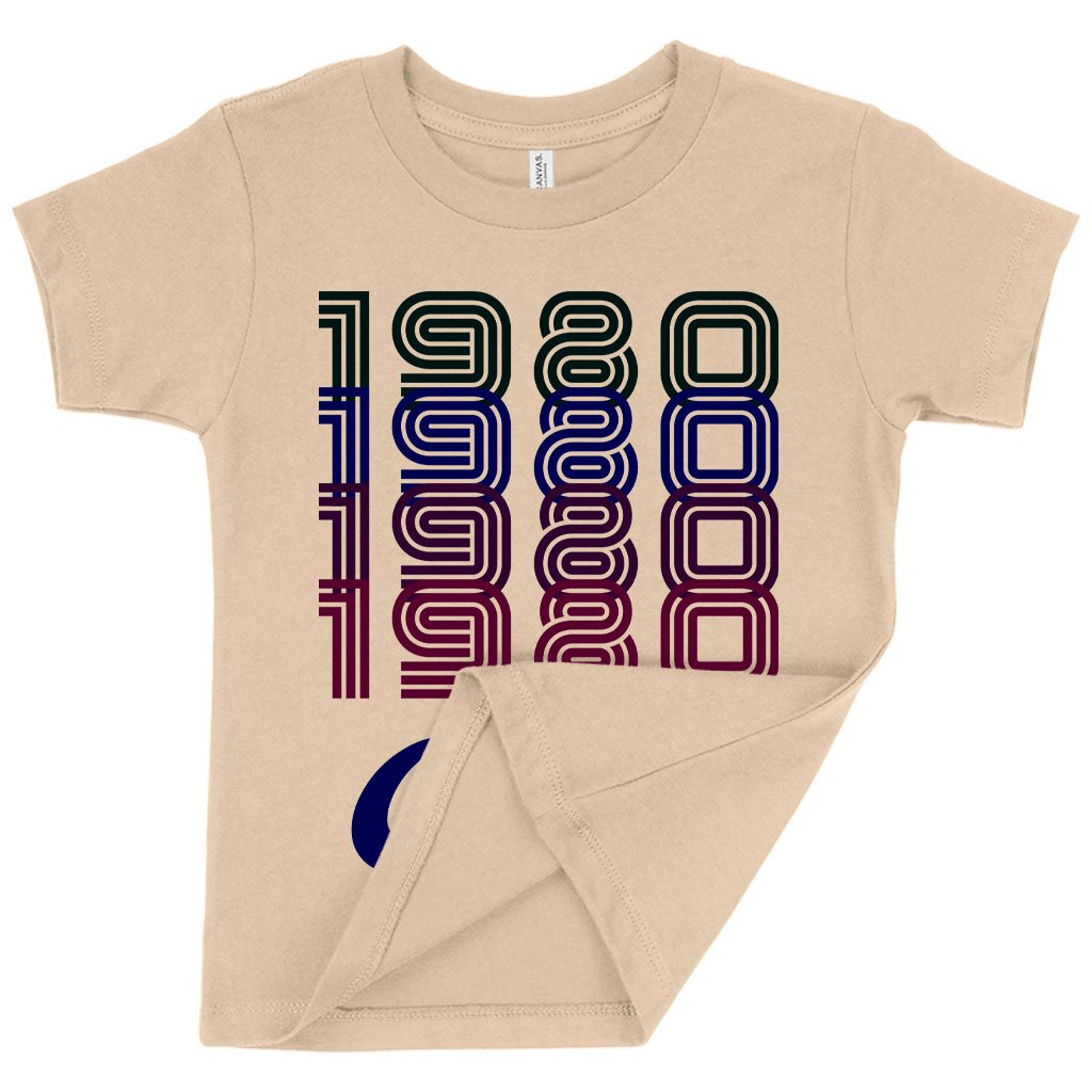 Toddler wearing a soft and stylish 1980 Classic T-Shirt, showcasing vibrant colors and retro design.