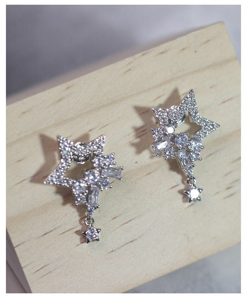 Transformable Dual Rhinestone Stars with Tassels Earrings showcasing dual star design with removable tassels, perfect for versatile styling.