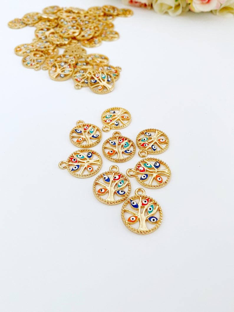 Gold Tree of Life Charm with Evil Eye design, perfect for jewelry making, featuring an enamel finish and measuring 18-20mm in diameter.