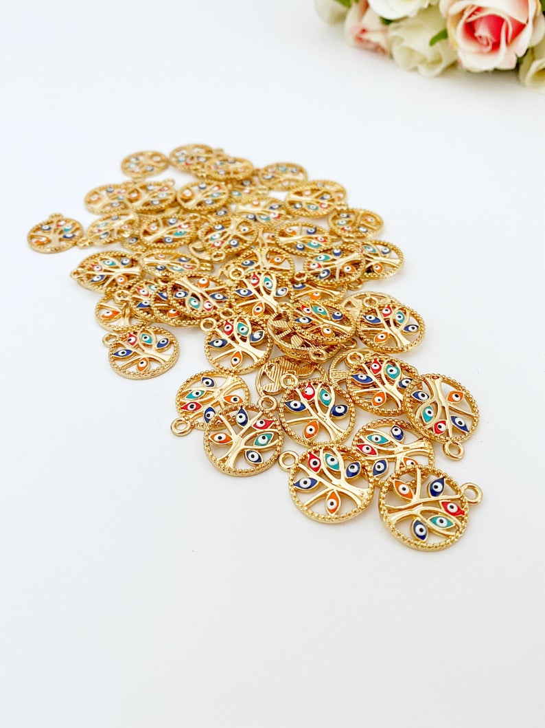 Gold Tree of Life Charm with Evil Eye design, perfect for jewelry making, featuring an enamel finish and measuring 18-20mm in diameter.