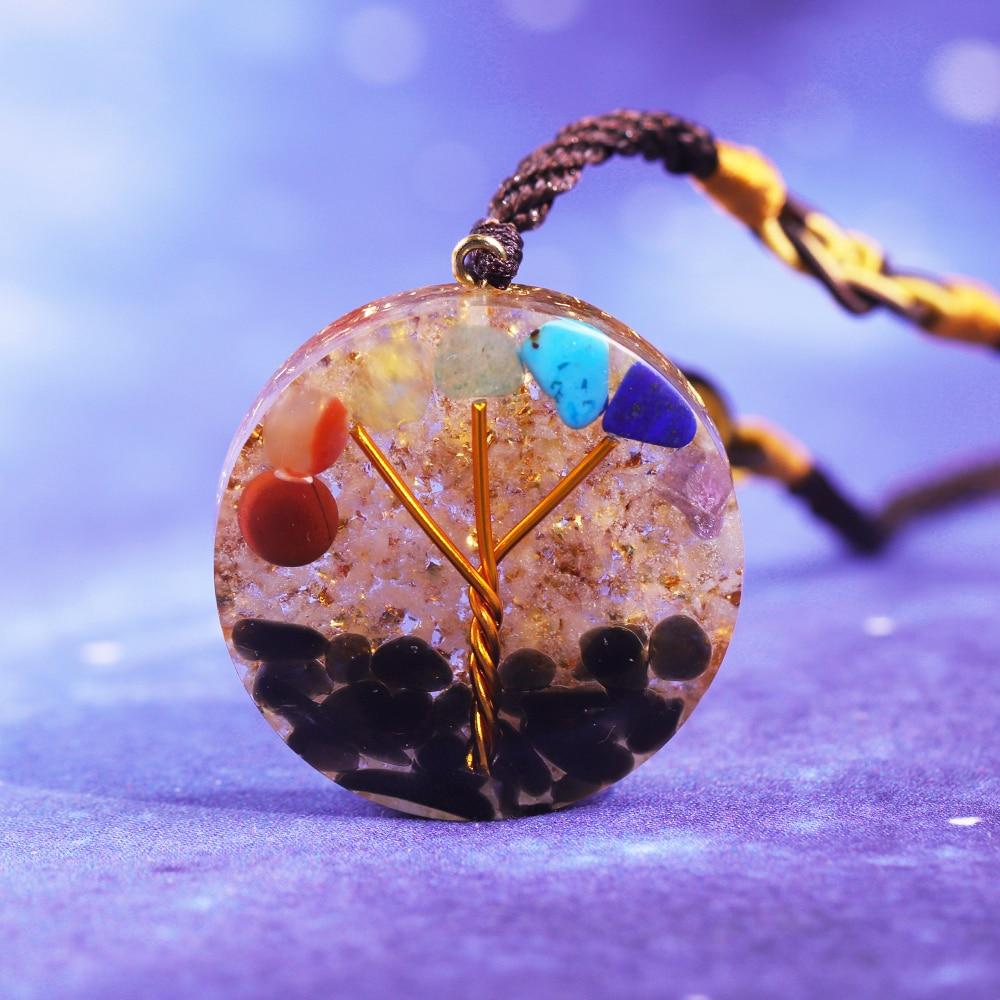 Tree Of Life Orgone Pendant featuring rainbow crystal stones and a geometric design, ideal for chakra healing and EMF protection.