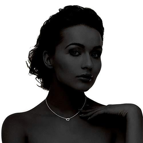 Trendy Twist Necklace in 14K white gold plating, featuring a unique twist design and adjustable length.