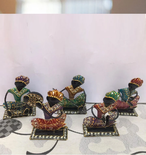 Set of 5 Tribal Musical Men Showpieces, hand-painted in vibrant colors, made of wrought iron, showcasing different musical instruments.