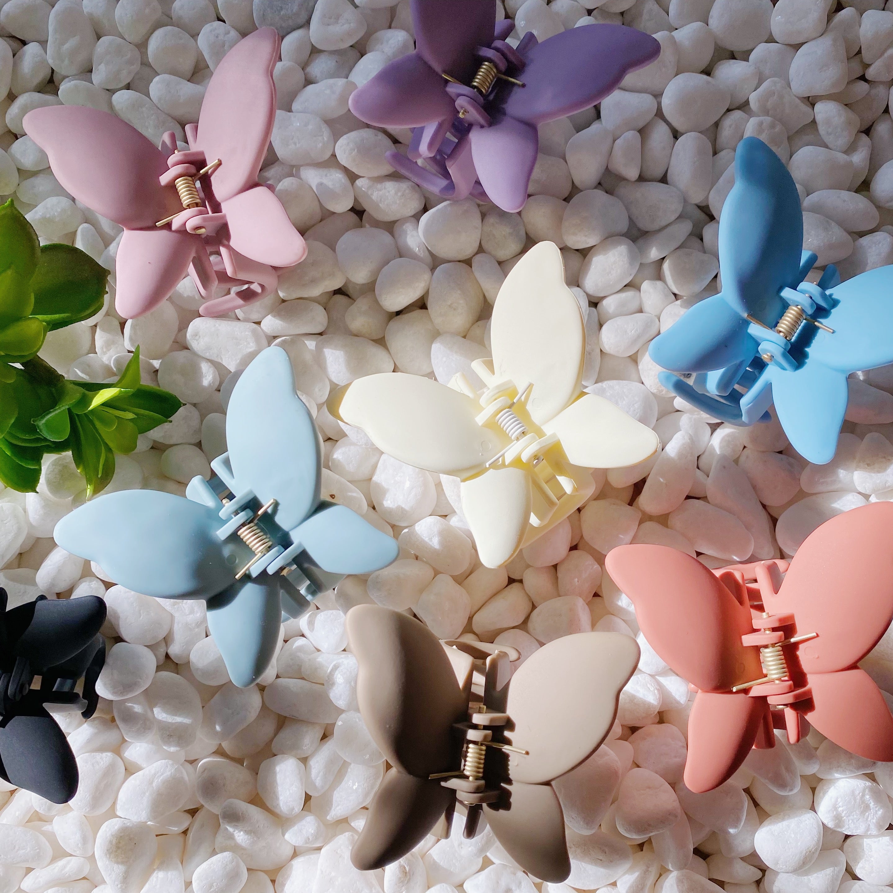 Trio of Butterflies Hair Claw Set featuring three colorful butterfly-shaped hair claws with a matte finish.