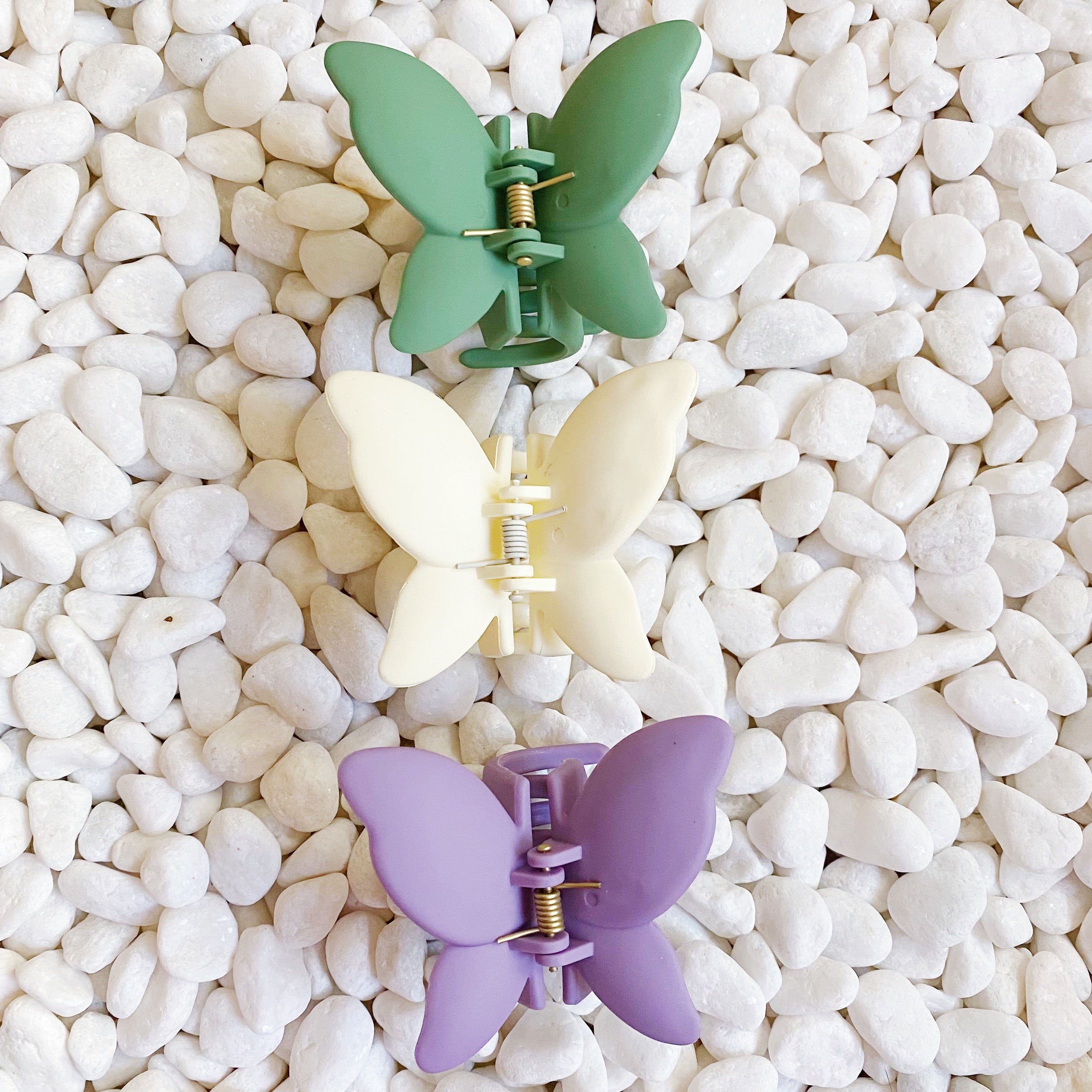 Trio of Butterflies Hair Claw Set featuring three colorful butterfly-shaped hair claws with a matte finish.
