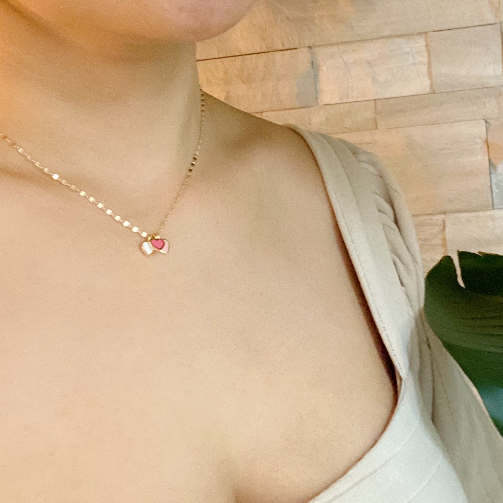 Triple My Love Necklace featuring three mini hearts on a dainty gold plated chain, perfect for everyday wear.