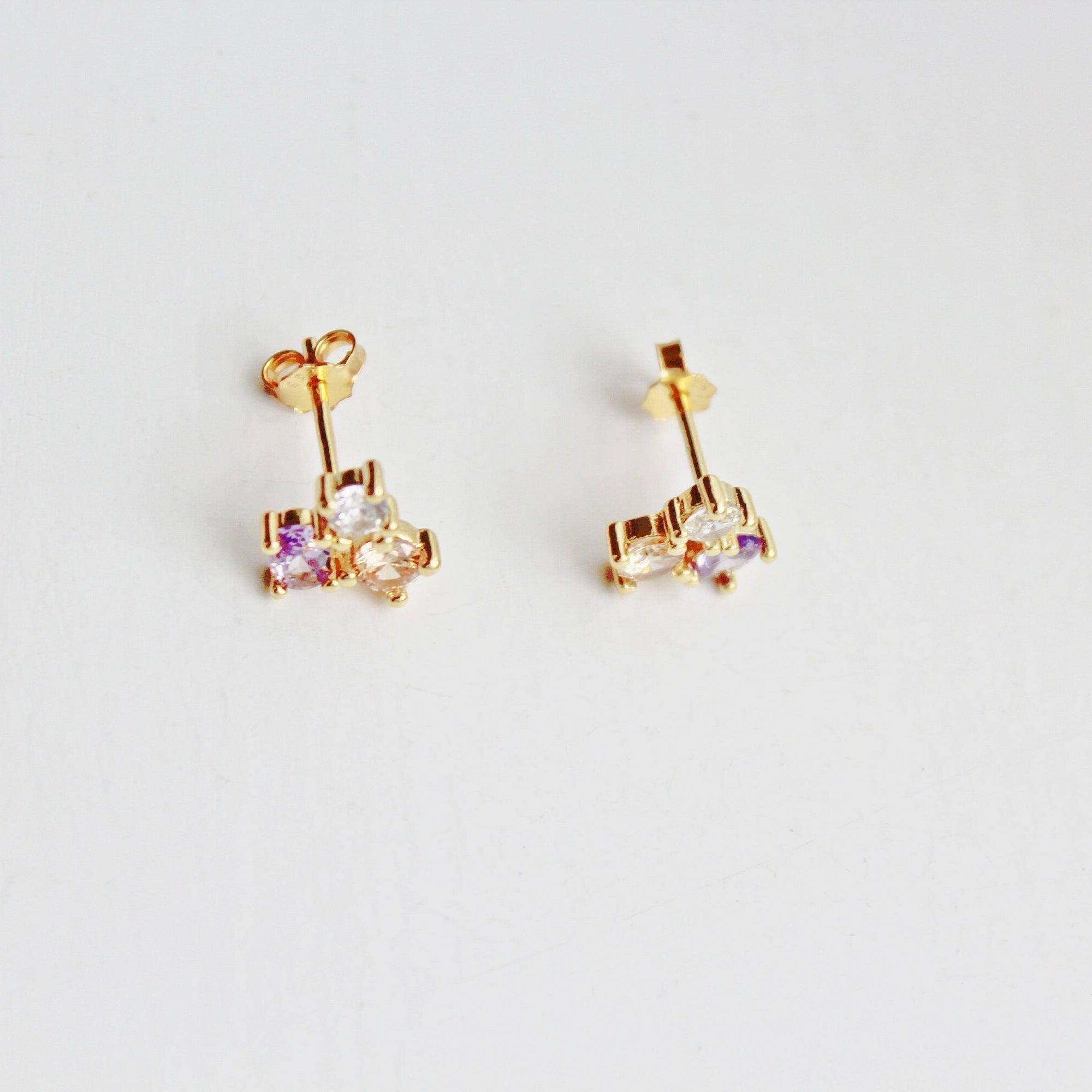 Tiny Triple Oval Earrings in gold-coated sterling silver with zircon crystals, showcasing a unique geometric design.