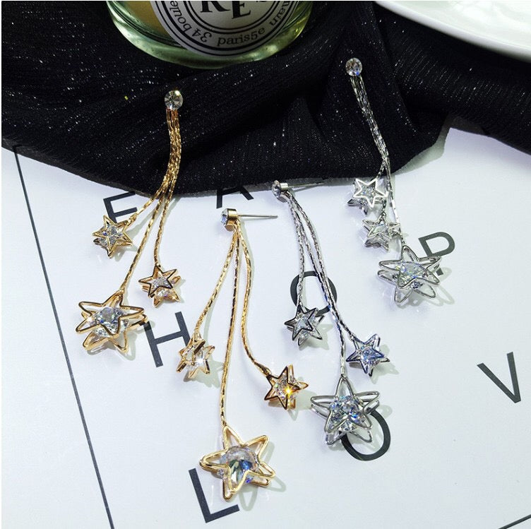 Triple Rhinestone Star Tassels Earrings featuring sparkling rhinestones and a chic star design, perfect for any occasion.