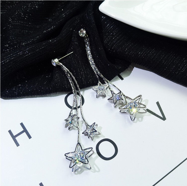 Triple Rhinestone Star Tassels Earrings featuring sparkling rhinestones and a chic star design, perfect for any occasion.