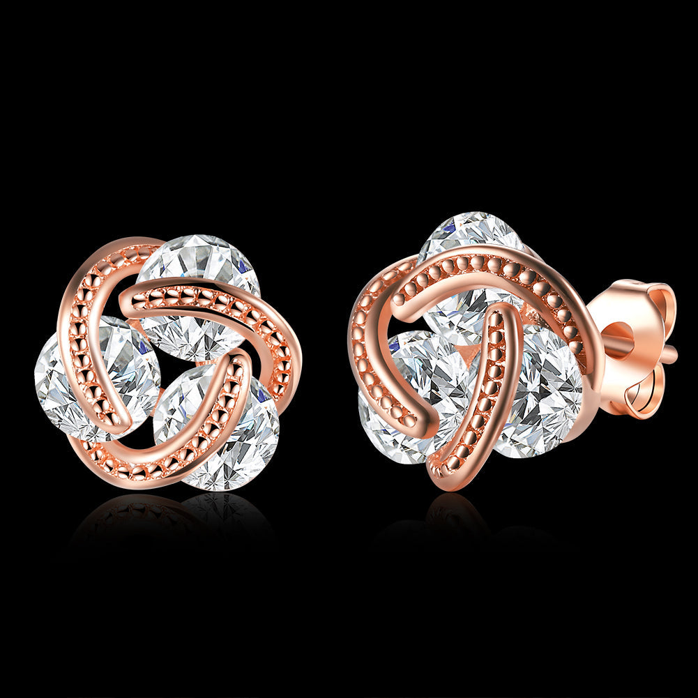 Triple Stone Knot Stud Earring in 18K Rose Gold Plated with Crystals, showcasing elegant design and sparkling details.