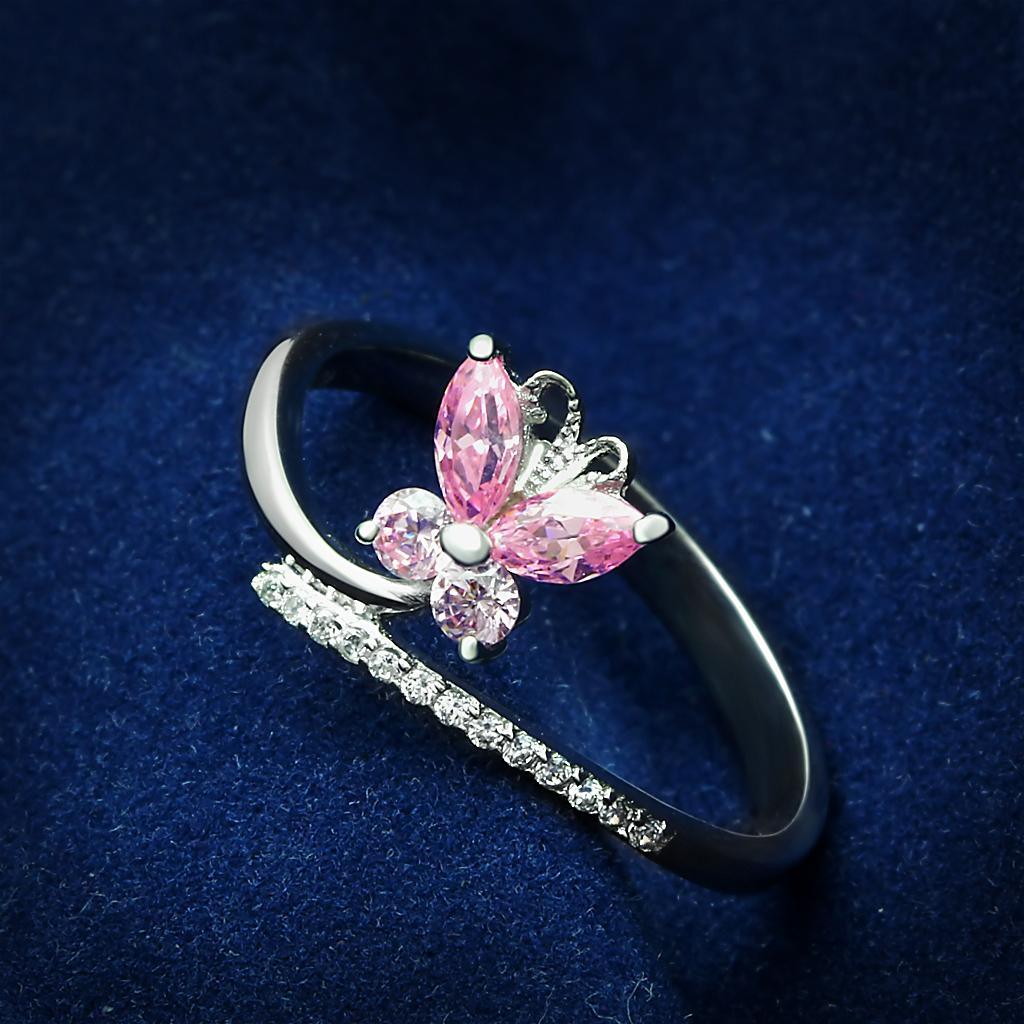 TS042 Rhodium 925 Sterling Silver Ring featuring AAA Grade CZ in Light Rose, showcasing its elegant design and sparkling center stone.