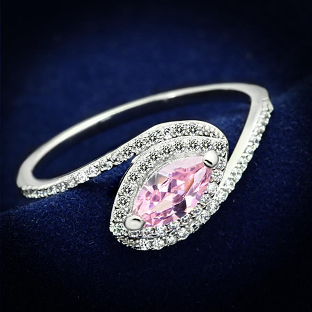 TS101 Rhodium 925 Sterling Silver Ring featuring a rose-colored AAA Grade CZ stone, showcasing elegance and craftsmanship.