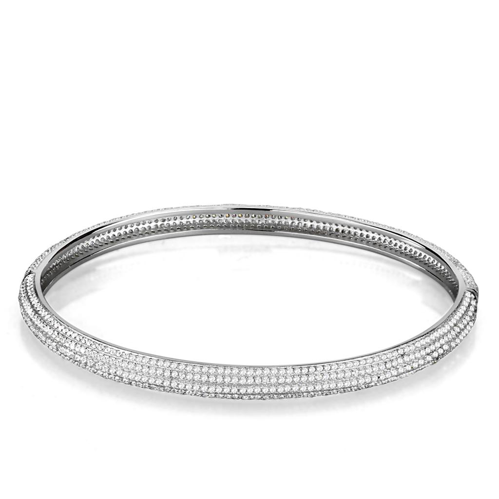 TS328 Rhodium 925 Sterling Silver Bangle featuring a clear AAA Grade CZ stone, showcasing its elegant design and high-quality materials.