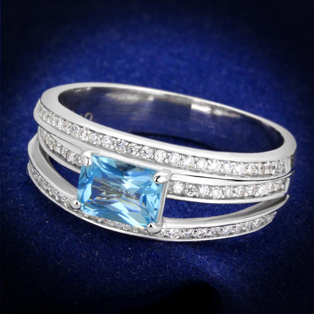 TS344 Rhodium 925 Sterling Silver Ring featuring a vibrant sea blue synthetic glass stone, elegantly designed for any occasion.