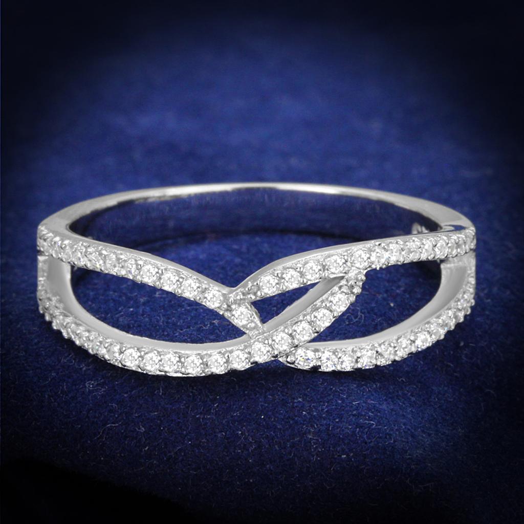 Diamond-studded infinity ring.