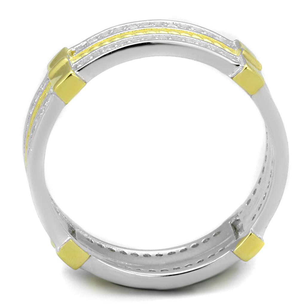 Two-tone metallic ring with diamonds.