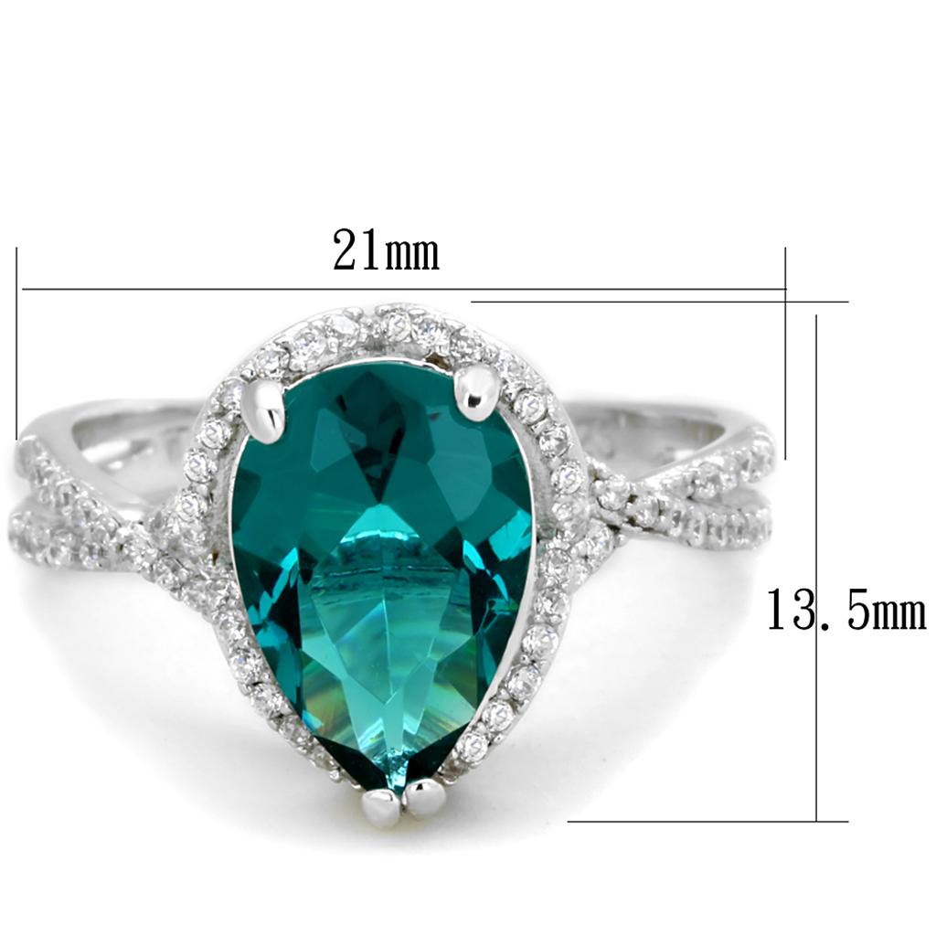 TS394 Rhodium 925 Sterling Silver Ring featuring a synthetic blue zircon stone, showcasing its elegant design and shiny finish.