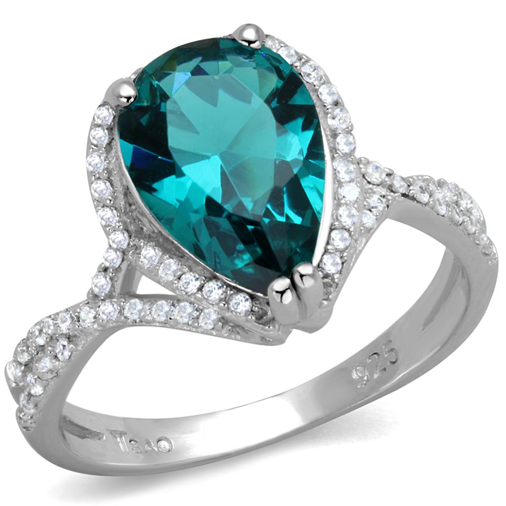 TS394 Rhodium 925 Sterling Silver Ring featuring a synthetic blue zircon stone, showcasing its elegant design and shiny finish.