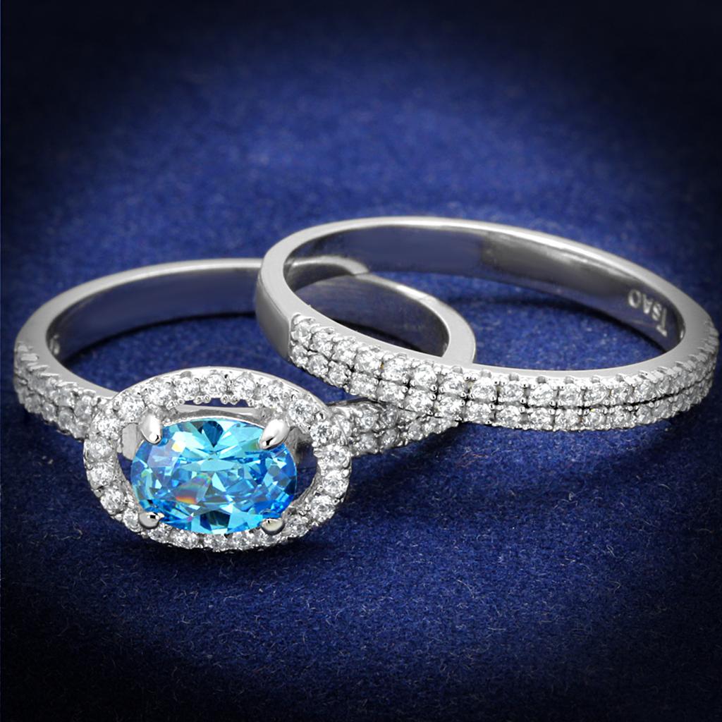 TS490 Rhodium 925 Sterling Silver Ring featuring a AAA Grade CZ in a vibrant sea blue color, showcasing its elegant design and craftsmanship.